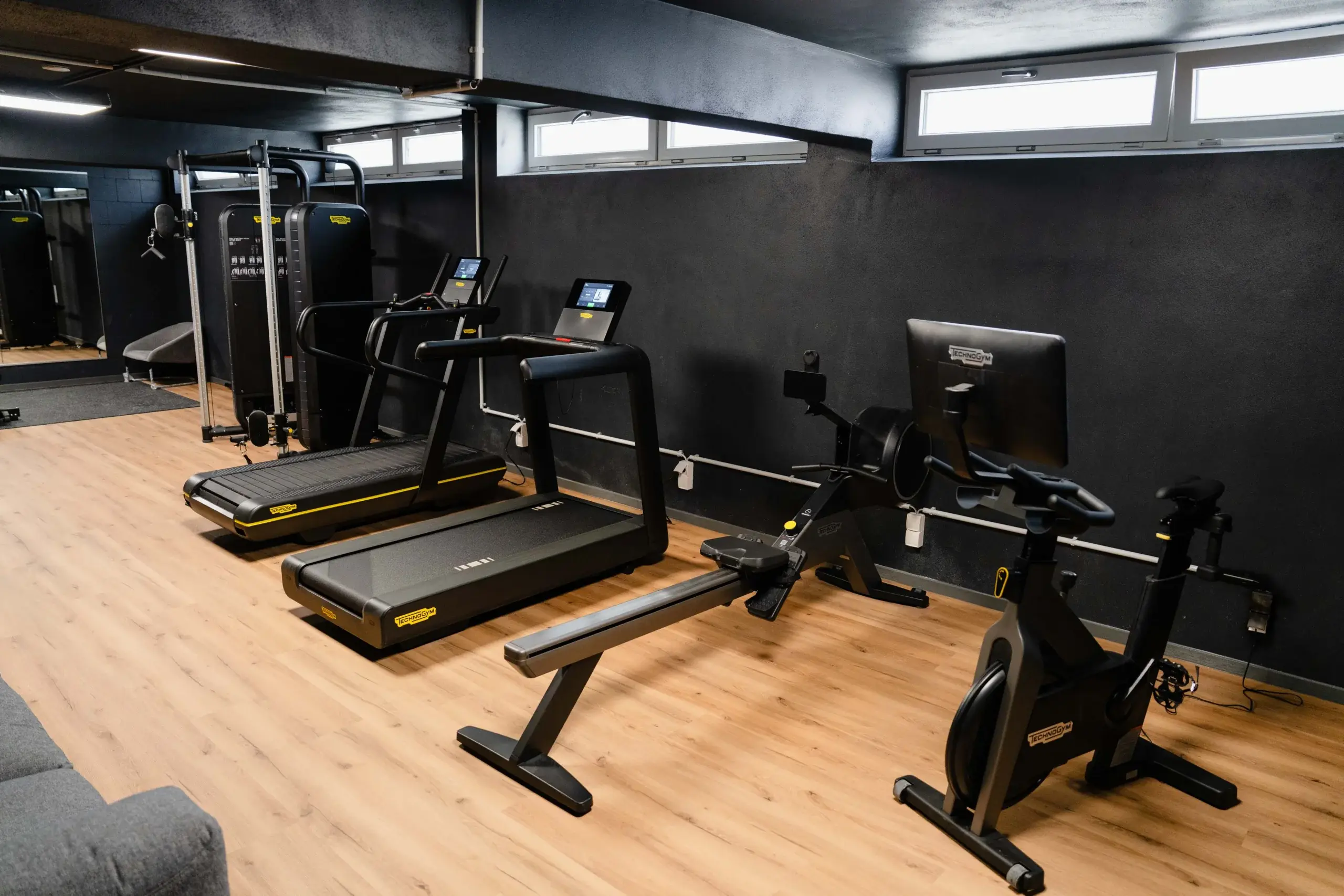 Fitnessstudio mit Technogym-Geräten der Eighty-Eight Apartments Nürnberg